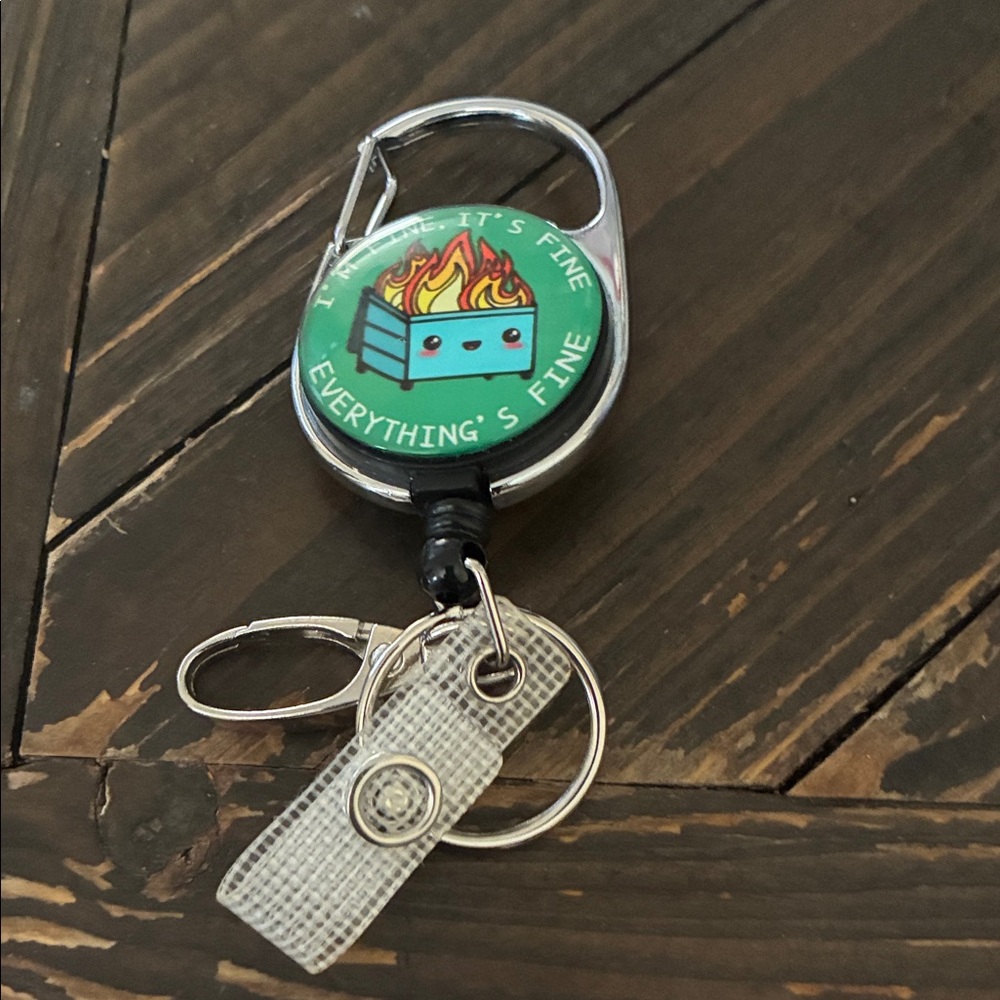 Green Keychain with Cartoon Design